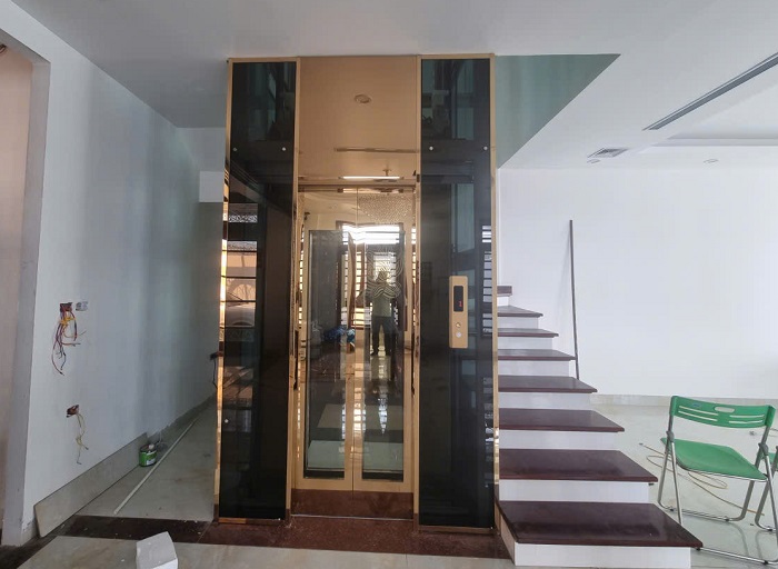 Thang máy homelift khung bao bản hẹp trán cao khung ốp kính đen
