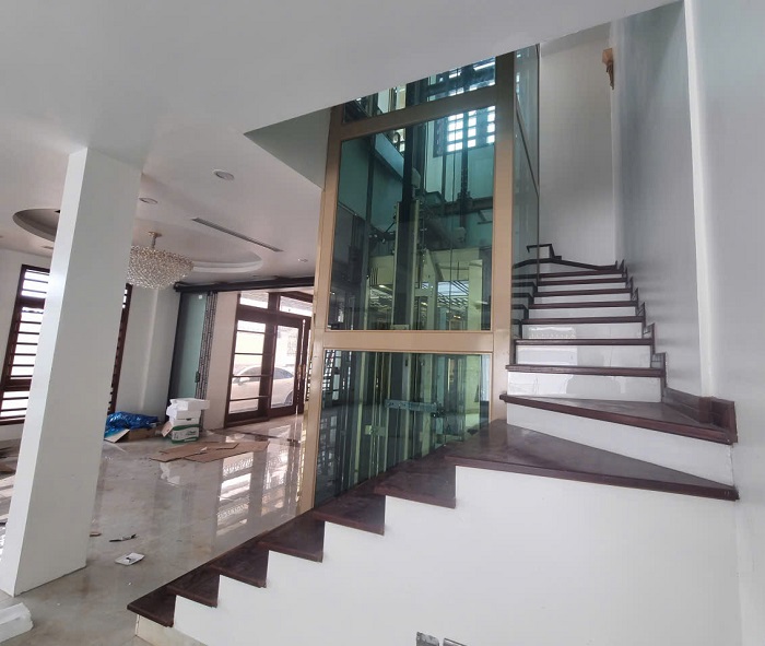 Kết cấu khung thép sơn tĩnh điện vàng kem kết hợp kính 2 lớp màu xanh, đen